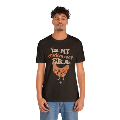 In my chicken coop era ᚾ THE OFFBEAT RUNARS CO. Unisex Jersey Short Sleeve Tee