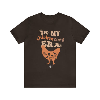 In my chicken coop era ᚾ THE OFFBEAT RUNARS CO. Unisex Jersey Short Sleeve Tee